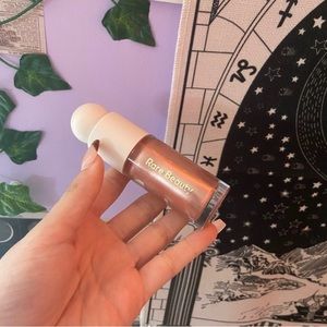 Rose Gold Rare Beauty Liquid Highlighter in Enchanted